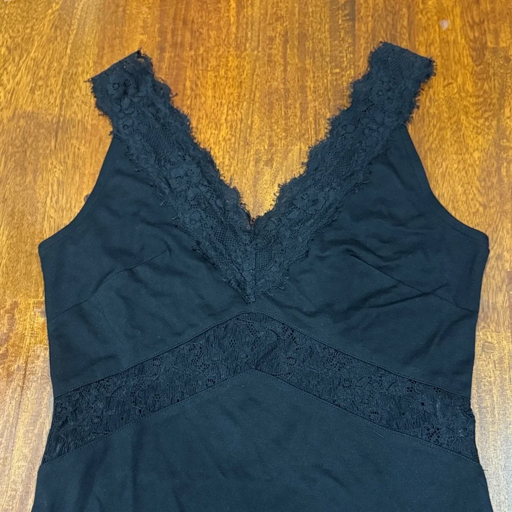 H&M Sexy Black Lace Trim Bodysuit size 8 fits like an M